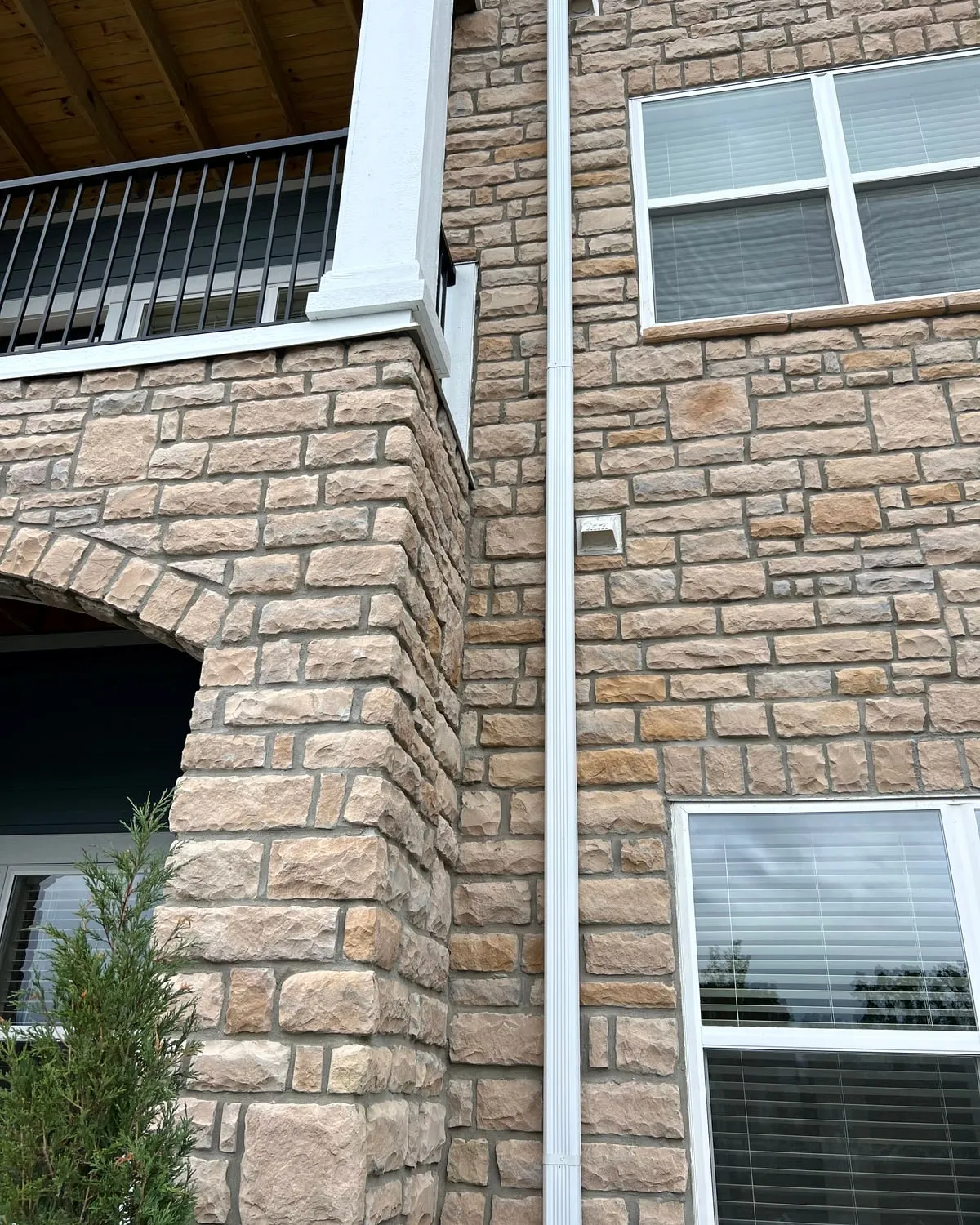 Stone veneer and arch